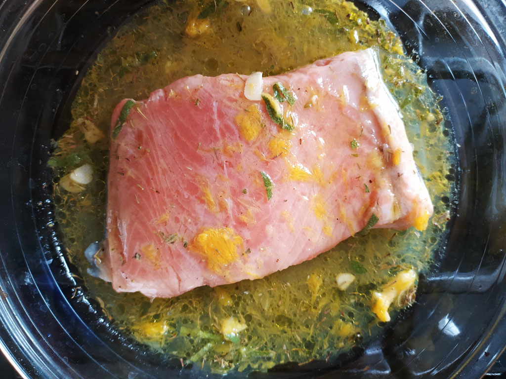 Salmon fillet while is marinating.